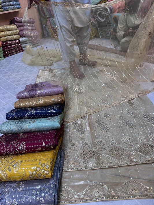 Silk Unstitched 3 Piece Suit with Net Dupatta